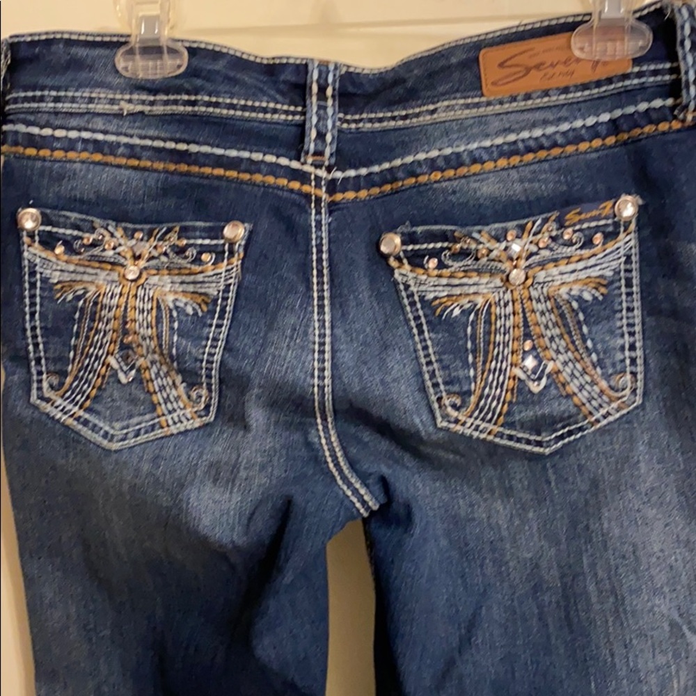 Seven 7 Jeans with bling ,size 8 wide cuff. EUC .
